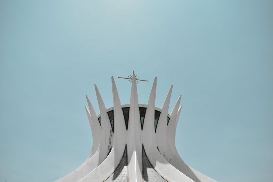Stunning view of the Cathedral of Brasília against a clear blue sky, showcasing its modern design.